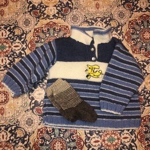 Hand-knitted toddler sweater.